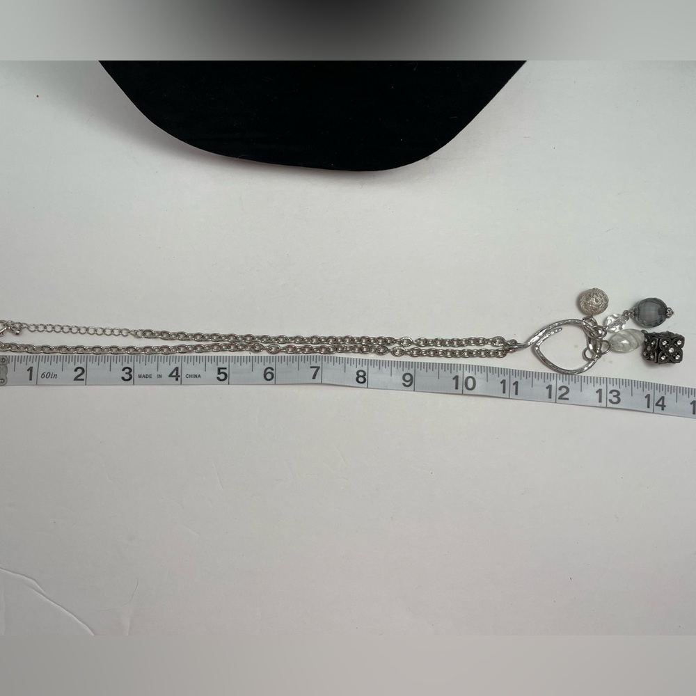 Silver tone charm necklace with round and square charms - Picture 3 of 4